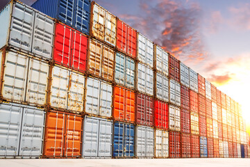 Row of Stacked Shipping Cargo Containers at The Port. Container Yard. Handling of Logistic...