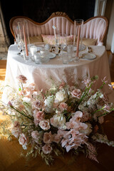 Elegant Wedding Table with Lush Floral Centerpiece