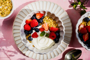 Yougurt bowl with granola and berries healthy protein breakfast