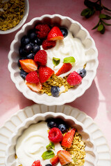 Yougurt bowl with granola and berries healthy protein breakfast
