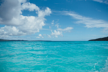 Obraz premium Experience the stunning turquoise waters and clear skies of Pele Island in Vanuatu, a tropical paradise escape