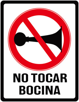 sign warning not to honk in Spanish. No honking