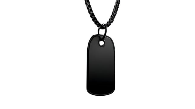 Isolated black dog tag pendant hanging from a chain, captured against a solid black studio background