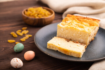 Сottage cheese Сasserole, Curd cake, with dried apricots and raisins on brown wooden, side view, selective focus