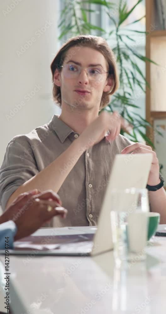Aufkleber man, discussion and meeting at startup in boardroom for review, planning and proposal at tech compan
