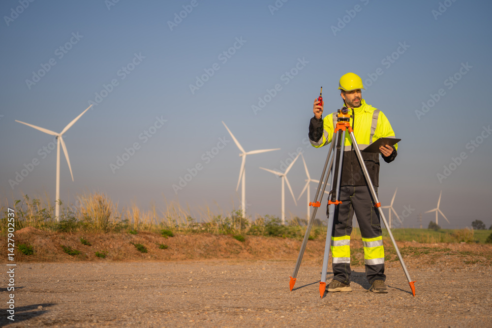 Poster engineer man working at windmill farm generating electricity clean energy. wind turbine farm generat