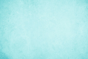Pastel blue and white concrete stone texture for background in summer wallpaper. Cement and sand wall of tone vintage. Concrete abstract wall of light cyan color, cement texture mint green for design.