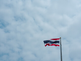 Thai flag with clear afternoon sky for copy space or background.