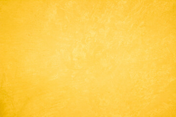 Yellow concrete stone texture for background in summer wallpaper. Cement and sand wall of tone vintage minimal. Concrete abstract wall of light yellow color, cement texture white blank for home decor.