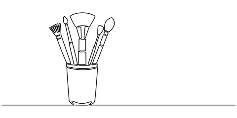Continuous one line drawing of pencils and brushes in a glass. Brush and pencils in single line draw illustration. Editable stroke, Stationery container with pencil, pens, rulers outline drawing pro..