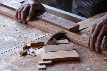 Sawing wood with a sawmill in a factory
