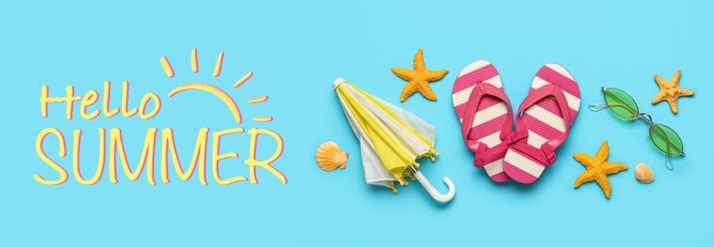 Composition with beach accessories on light blue background. Hello, summer