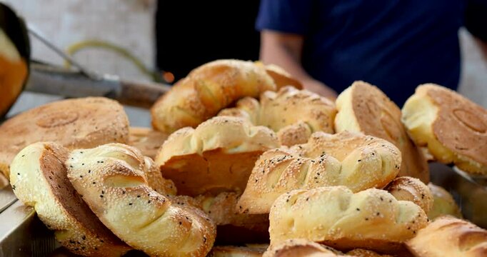 Traditional Uzbek bread being baked fresh in a local tandir oven