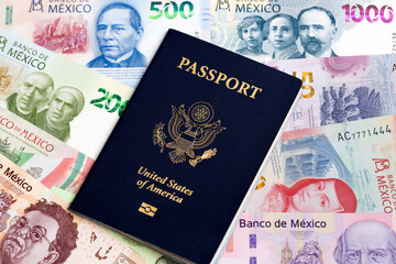 American passport on a Mexican money