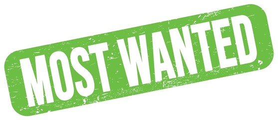 MOST WANTED text on green grungy stamp sign. © outchill