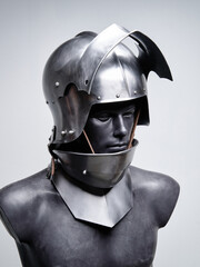 Medieval Metal Armor Helmet Display on a Black Mannequin..