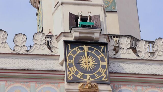 Poznań Goats tourist attraction. Mechanical goats butting heads on clock tower of the Poznan City Hall. Town Hall, Old Market Square.