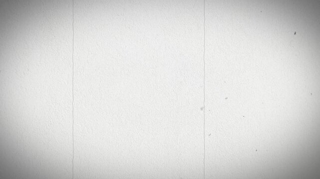 Vintage paper texture with crease, stain, grain, dust particles. Aged old page overlay effect background loop animation.