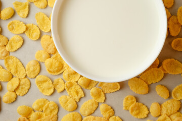 Morning delight featuring crispy corn flakes surrounded by creamy milk