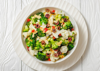Italian Broccoli Cauliflower Salad in a white bowl