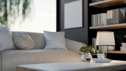 A large fabric sofa with cushion and square marble table in living room or study room. Cosy Interior