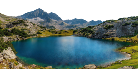 Alpine landscape with snowy mountains and calm lake, isolated on transparent cutout background