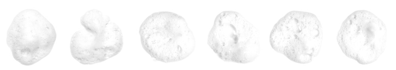 Liquid white foam from soap, shampoo or bath foam. Abstract soap bubbles. Set of soap bubbles. Separated soap bubbles on white background with contrasting texture.	
