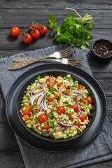 Barley salad with vegetables and walnuts in a bowl