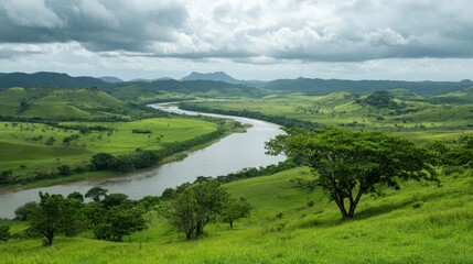 Obraz premium Serene river landscape lush green valley