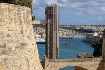 Modern Barrakka Lift connects historic bastions with Grand Harbour, Valletta, Malta