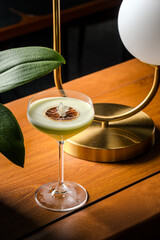 Elegant Green Cocktail Delicate Garnish Ambient Lighting