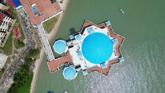 Penang, Malaysia: Aerial top down drone footage of the floating mosque near George Town in Penang island in Malaysia. 