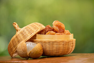 Fresh and dried Longan or Dimocarpus longan Lour. fruits on natural background.