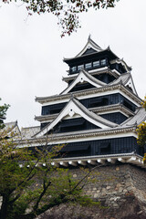 Kumamoto Castle, exterior view, Kumamoto city, Chuo-ku, Kyushu island region, Japan, spring landscape view and blooming sakura cherry blossom, Kumamoto prefecture, travel to Japan, Japanese castle
