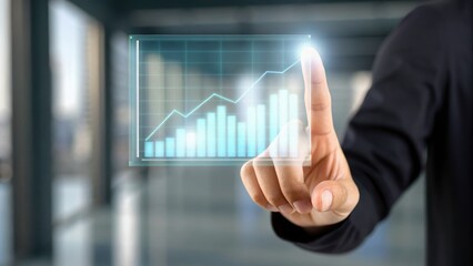 A hand interacts with a digital graph, symbolizing growth and data analysis in a modern business environment.