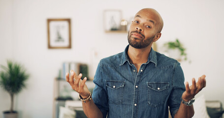 Portrait, asking or man with question in home as creative freelancer or house interior designer....