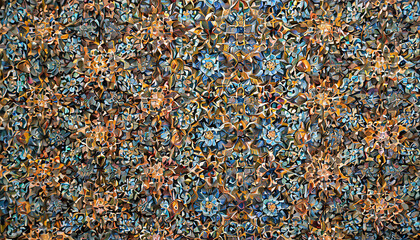 Abstract artwork featuring intricate patterns and vivid colors, resembling a mosaic of flowers and geometric shapes.