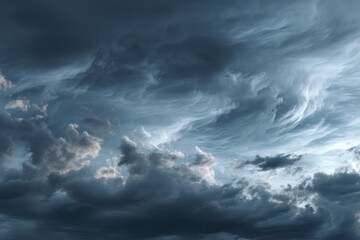 Obraz premium Dramatic stormy sky with dark clouds, showing a textured and menacing atmosphere, before rainfall, with intense weather patterns above the horizon line.