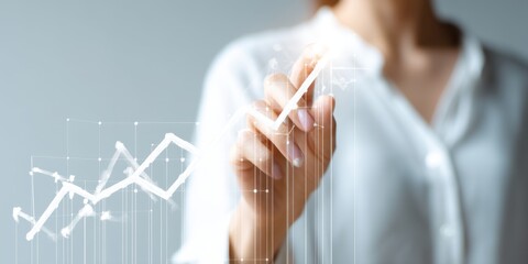 Businesswoman sketching growth graph with digital data on virtual screen, illustrating financial advertisement concept for corporate strategy and marketing technology.