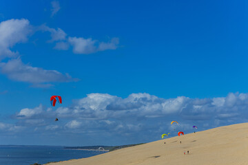 People paragliding at the Dune of Pilat