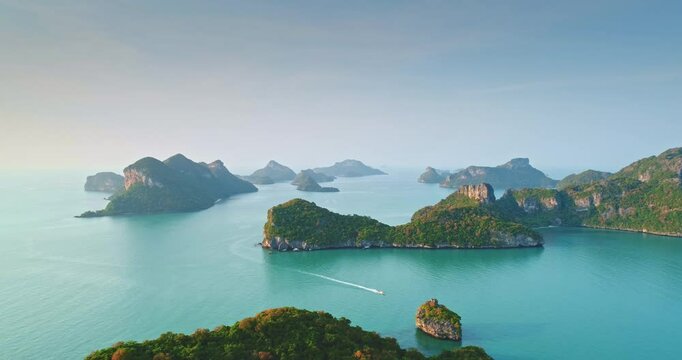 Aerial view capturing Mu Ko Ang Thong National Marine Park, an enchanting archipelago of 42 islands with stunning limestone cliffs and crystal-clear turquoise waters