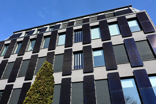 Ł&oacute;dź, Lodz, Poland, Europe - 03.2025 : High Technical School building, wall covered with solar panels, southern facade of Passive building - Institute of Applied Computer science, W&oacute;lczańska street