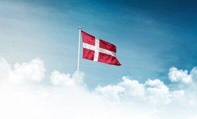 Denmark national flag with mast waving in beautiful sky. Denmark flag for Republic Day and...