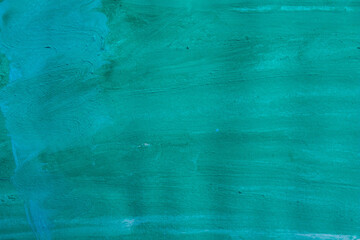 Bright and textured watercolor background in vibrant shades of green, featuring soft brush strokes and subtle gradients