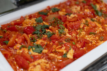 Delicious Stir-Fried Tomatoes and Eggs with Fresh Cilantro Garnish