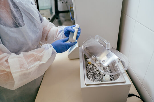 Checking warmed donor milk sample in neonatal lab