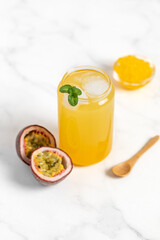 tropical Bubble Tea, Isolated on White Background. Colorful, Fresh Orange Boba Drink with Fruit Fizzy Jellies and Ice Cubes. Tapioca pearls. 