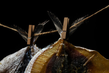 Dried imperial salmon on a black background.