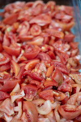 Fresh Chopped Tomato Pieces in Clear Container Ready for Cooking or Salad
