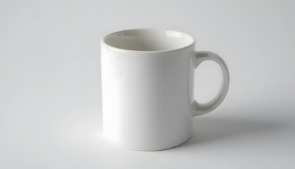 Obraz premium Minimalist White Ceramic Mug on Spotless White Surface
